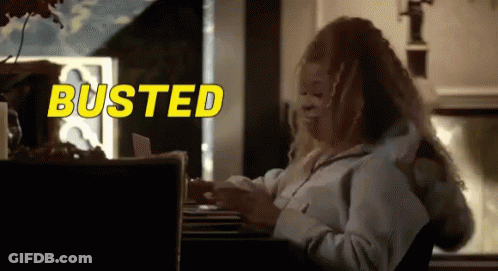 Woman Sitting At Desk With Busted Behind GIF