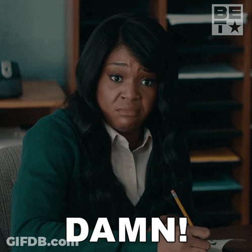 Woman Sitting At Desk With Damn GIF
