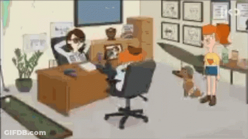 Woman Sitting At Desk With Dog GIF