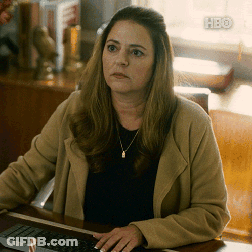 Woman Sitting At Desk With HBO Logo GIF