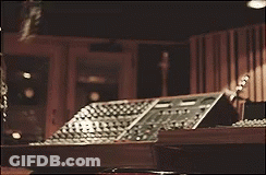 Woman Sitting At Desk With Instruments GIF
