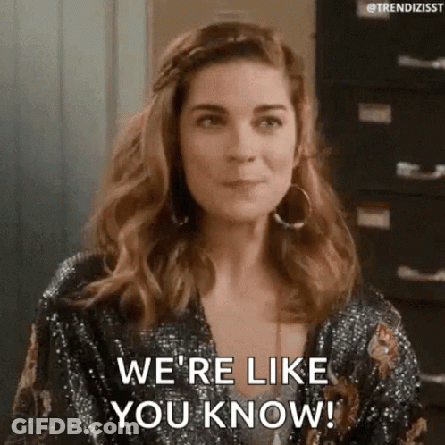 Woman Sitting At Filing Cabinet Saying We're Like You Know GIF