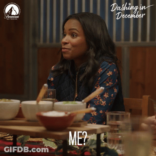 Woman Sitting At Food Bowls With Paramount Logo GIF