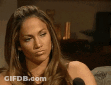 Woman Sitting At Microphone Making Funny Face GIF