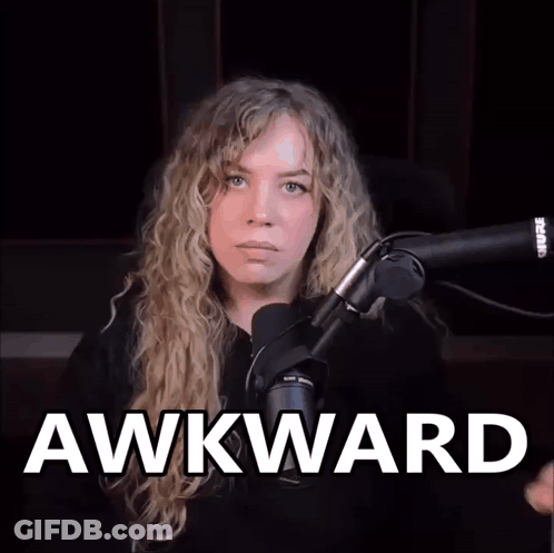 Woman Sitting At Microphone Saying Awkward GIF