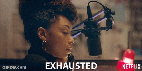 Woman Sitting At Microphone Saying Exhausted GIF
