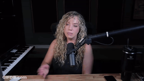 Woman Sitting At Microphone Saying Swoon GIF