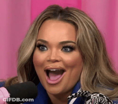 Woman Sitting At Microphone With Mouth Open GIF