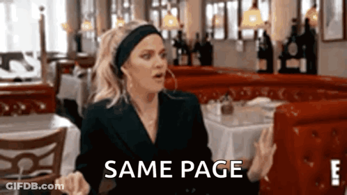 Woman Sitting At Restaurant Table With Same Page GIF