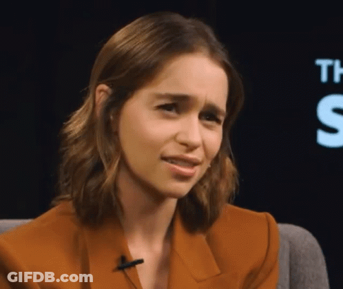 Woman Sitting At Sign The S GIF
