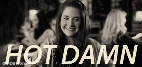 Woman Sitting At Table Hot Damn GIF
