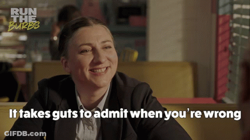 Woman Sitting At Table It Takes Guts To Admit When You're Wrong GIF