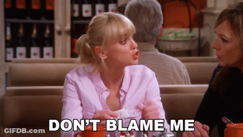 Woman Sitting At Table Saying Don't Blame Me GIF
