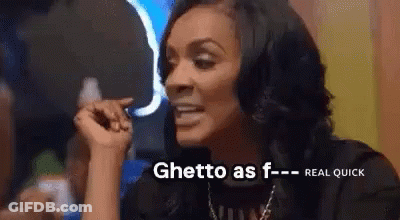 Woman Sitting At Table Saying Ghetto As F GIF