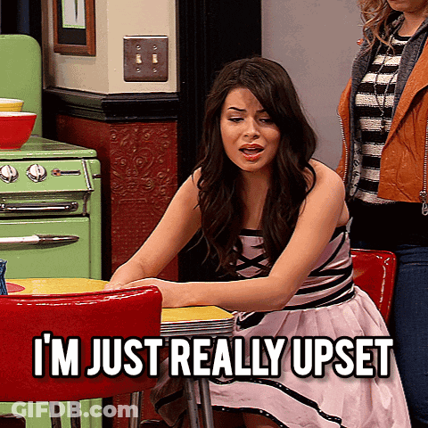 Woman Sitting At Table Saying I'm Really Upset GIF