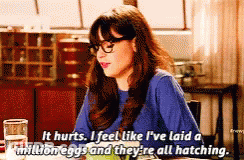 Woman Sitting At Table Saying It Hurts GIF