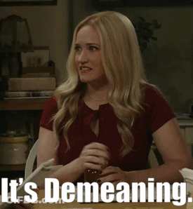 Woman Sitting At Table Saying It's Demeaning GIF