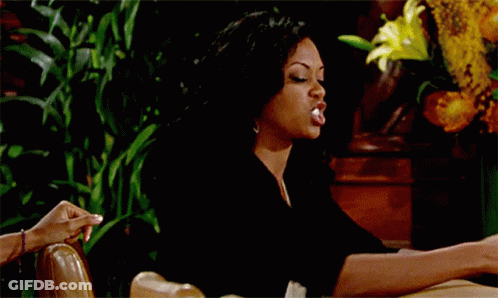 Woman Sitting At Table Saying Shut Up GIF