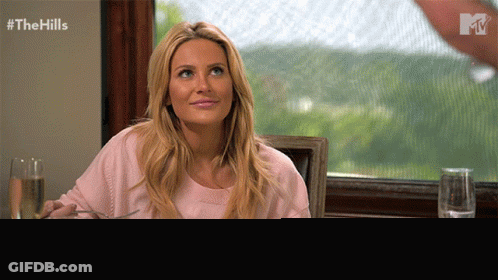 Woman Sitting At Table Saying You Look So Nice GIF