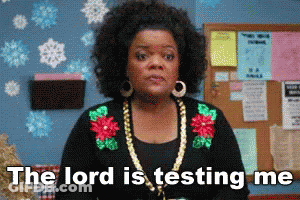 Woman Sitting At Table With 9 Sign GIF
