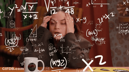 Woman Sitting At Table With Emm Mug GIF