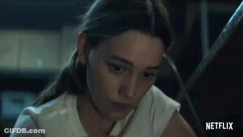 Woman Sitting At Table With Pencil GIF