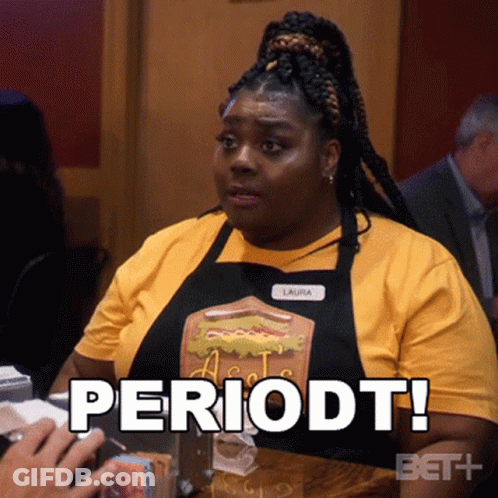 Woman Sitting At Table With Periodt GIF