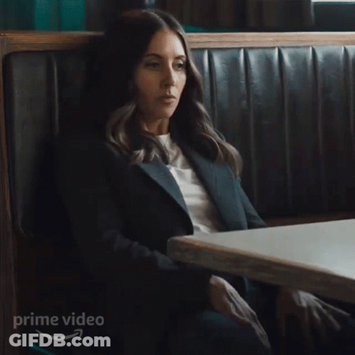 Woman Sitting At Table With Prime Video GIF