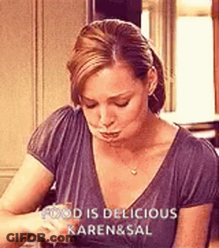 Woman Sitting At Table With Wine GIF