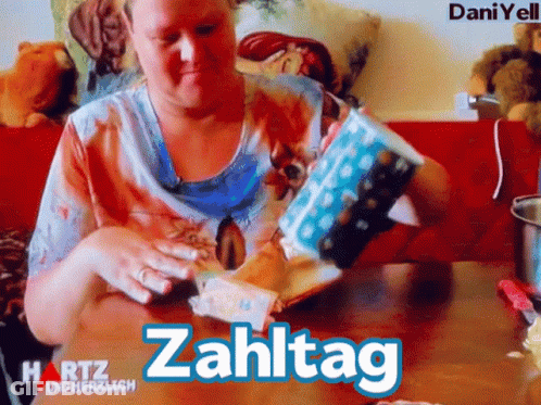 Woman Sitting At Table With Zahltag GIF