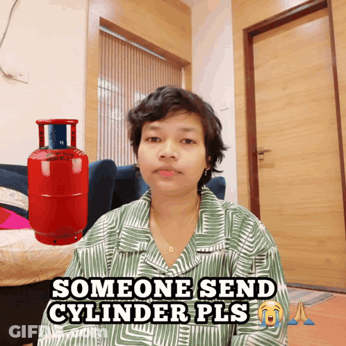 Woman Sitting By Red Gas Cylinder Someone Send Cylinder Pls GIF