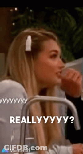 Woman Sitting Drinking Glass Saying Really GIF