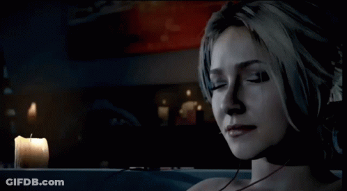 Woman Sitting In Bathtub With Candle GIF