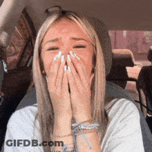 Woman Sitting In Car Covering Face GIF