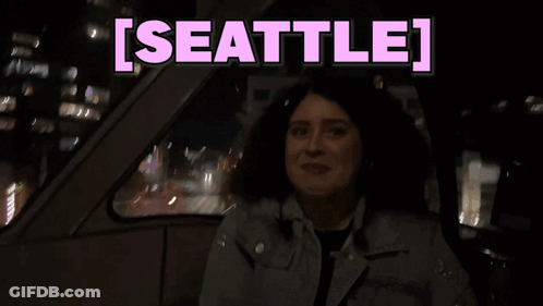 Woman Sitting In Car Saying Seattle GIF