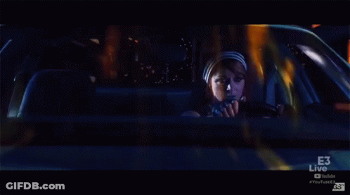 Woman Sitting In Car With E3 Live GIF