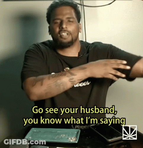 Woman Sitting In Chair Arms Up Saying That's Why You're My Man GIF