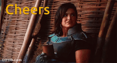 Woman Sitting In Chair Cheers GIF