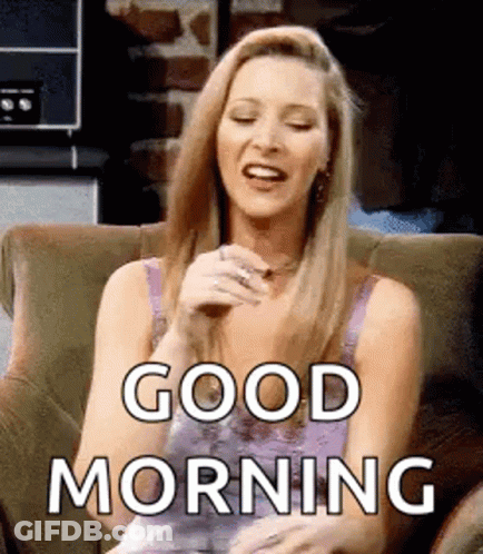 Woman Sitting In Chair Eyes Closed Saying Good Morning GIF