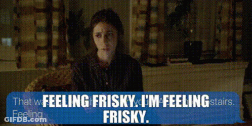 Woman Sitting In Chair Feeling Frisky GIF