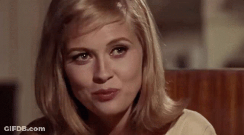 Woman Sitting In Chair Making Face GIF