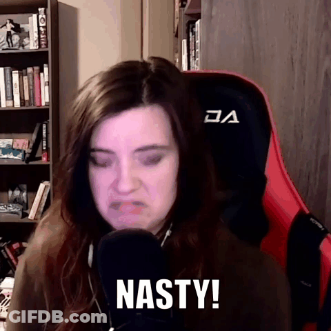 Woman Sitting In Chair Making Funny Face GIF