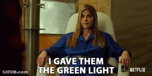 Woman Sitting In Chair Saying I Gave Them The Green Light GIF