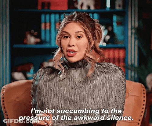 Woman Sitting In Chair Saying I'm Not Succumbing To Pressure Of Awkward Silence GIF