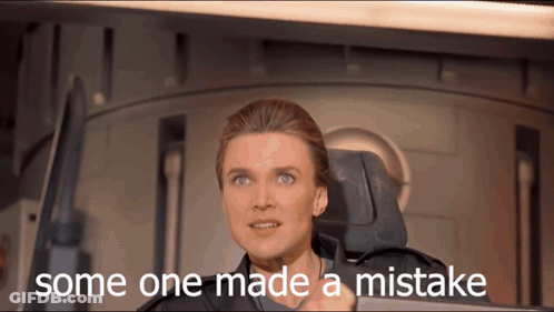 Woman Sitting In Chair Saying Someone Made A Mistake GIF