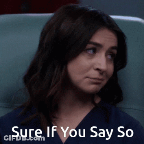 Woman Sitting In Chair Saying Sure If You Say So GIF