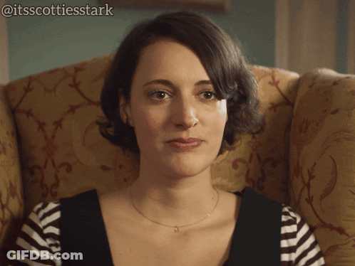 Woman Sitting In Chair Tough Crowd GIF