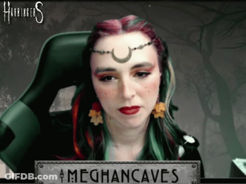 Woman Sitting In Chair With Meghancaves GIF