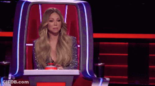 Woman Sitting In Chair With NBC Logo GIF