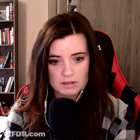 Woman Sitting In Chair With Number 1 GIF